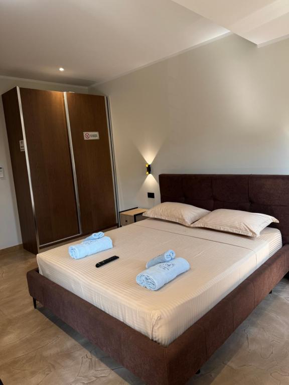 Postel nebo postele na pokoji v ubytování Ritson Hotel