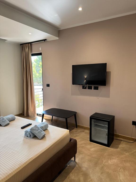 TV a/nebo společenská místnost v ubytování Ritson Hotel