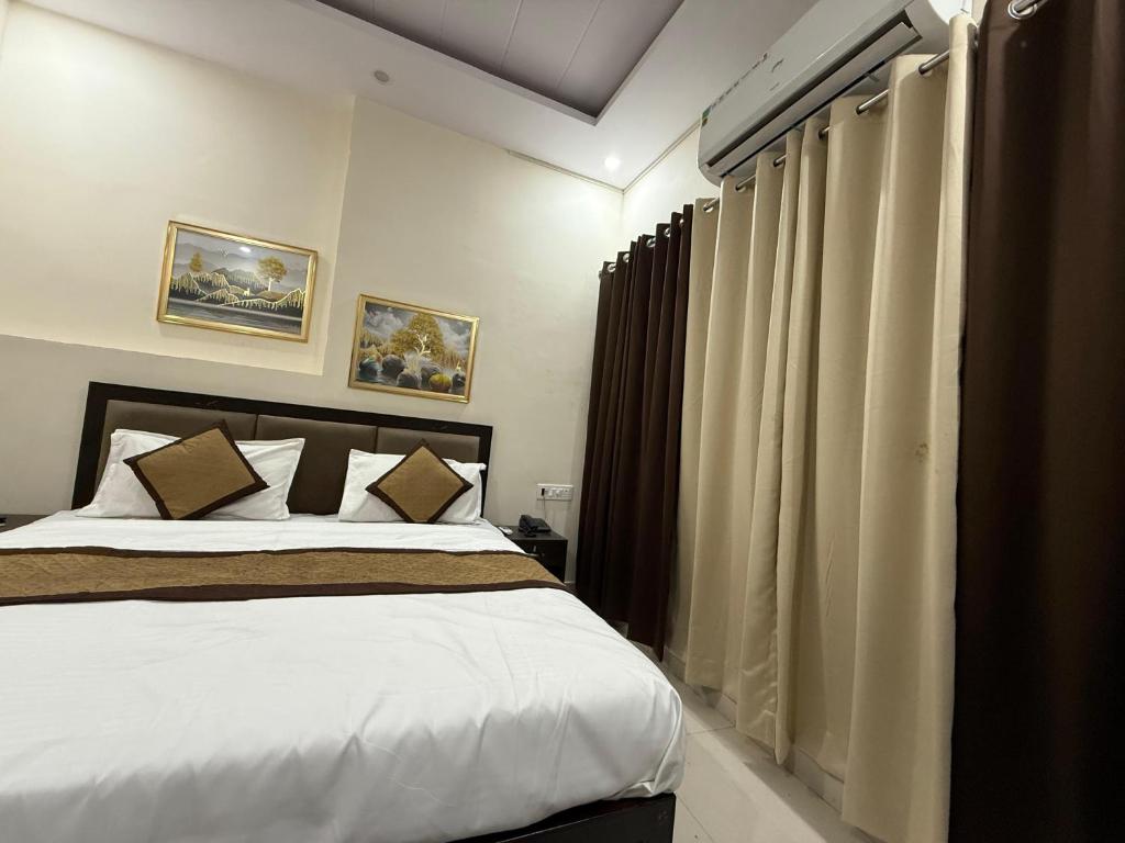 Postel nebo postele na pokoji v ubytování Hotel Pear