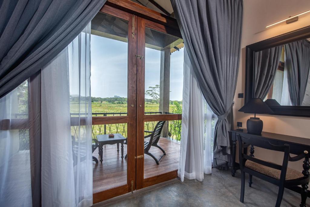 Balkón nebo terasa v ubytování Ceylon Breeze Sigiriya