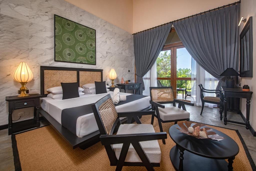 Postel nebo postele na pokoji v ubytování Ceylon Breeze Sigiriya