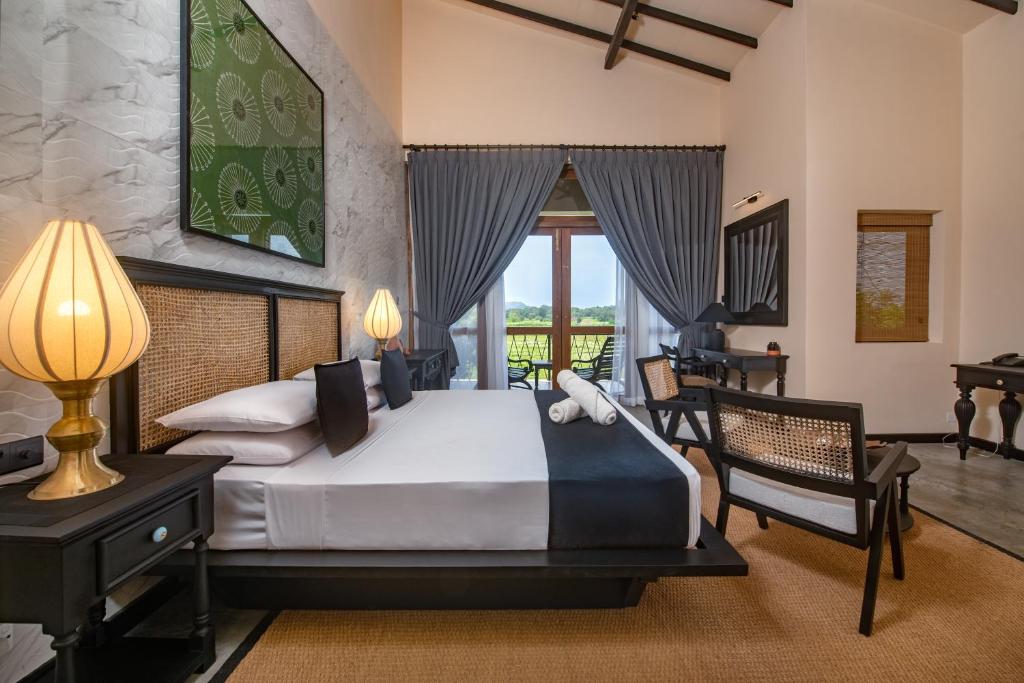 Postel nebo postele na pokoji v ubytování Ceylon Breeze Sigiriya