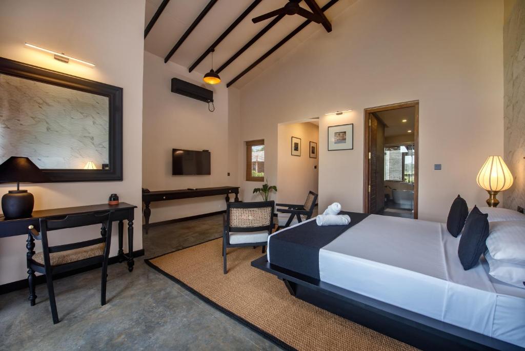 Postel nebo postele na pokoji v ubytování Ceylon Breeze Sigiriya