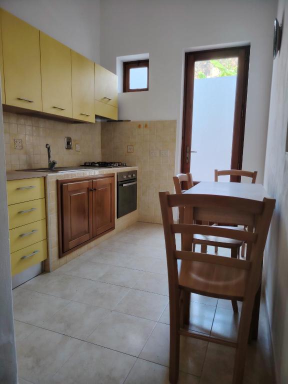 Kuchyň nebo kuchyňský kout v ubytování ANFORA Giallo