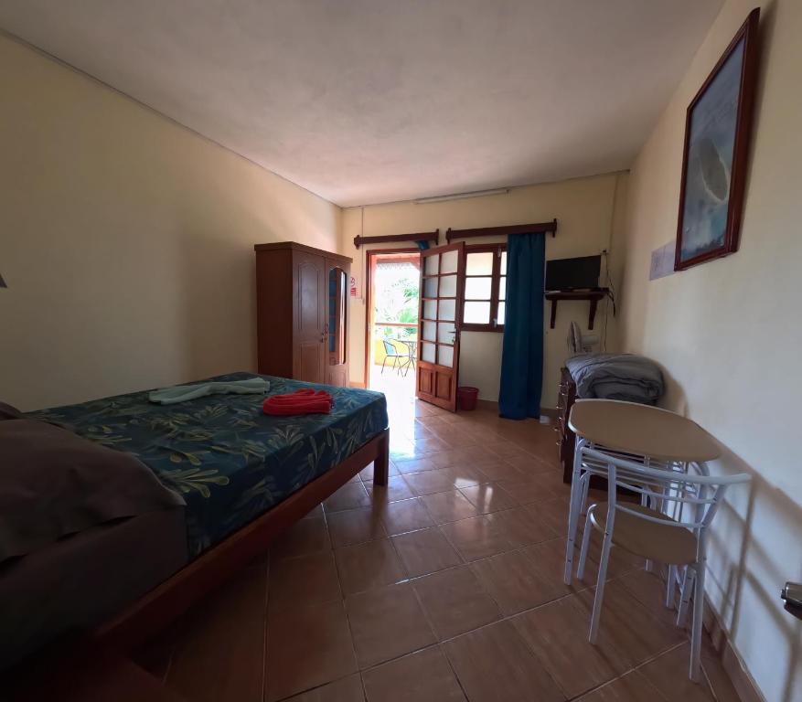 Postel nebo postele na pokoji v ubytování Le Tropical Chez Jeannette