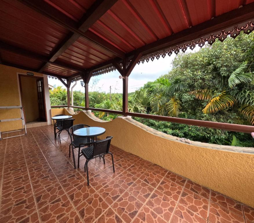 Balkón nebo terasa v ubytování Le Tropical Chez Jeannette