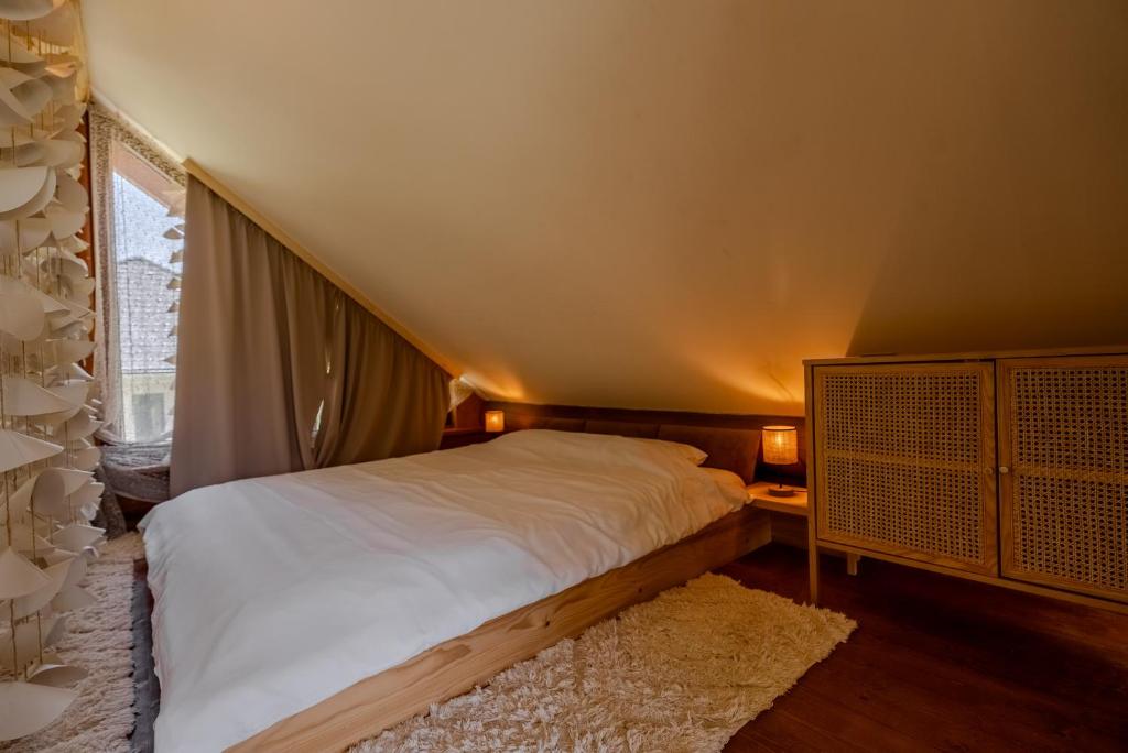 Postel nebo postele na pokoji v ubytování Chalet -VV