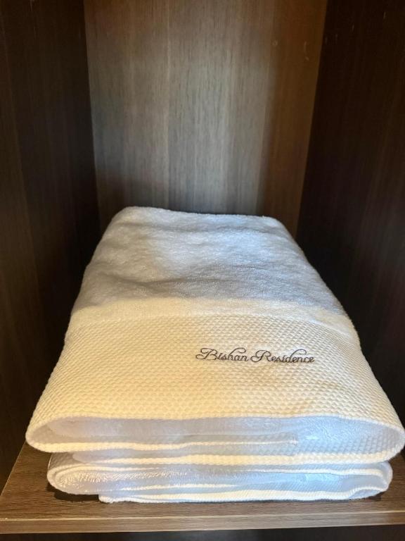 Postel nebo postele na pokoji v ubytování Xiamen Gulangyu Bishan Residence
