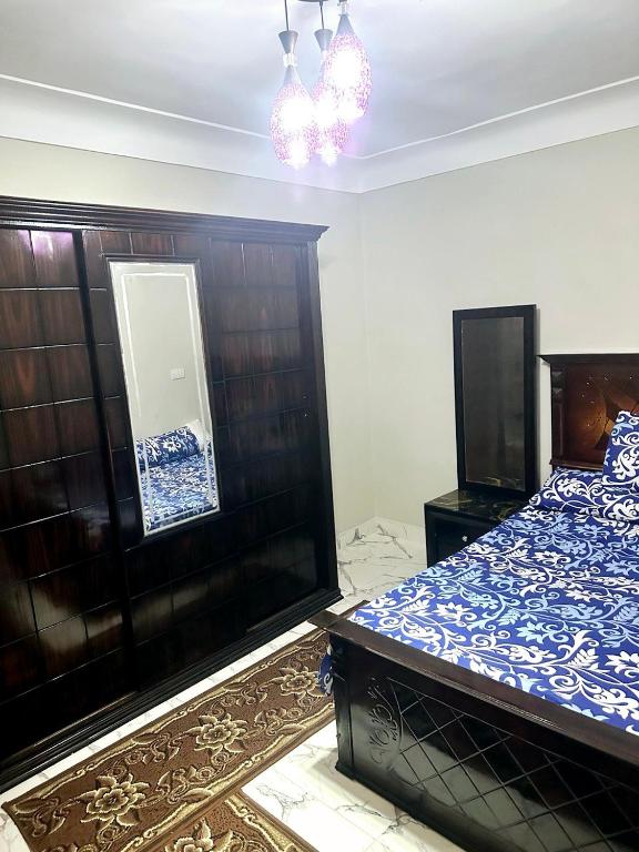 Postel nebo postele na pokoji v ubytování شقه خالد ابن الوليد بحر اول نمره