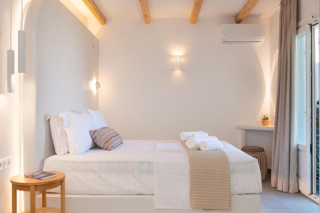 Postel nebo postele na pokoji v ubytování Hotel Efrosini