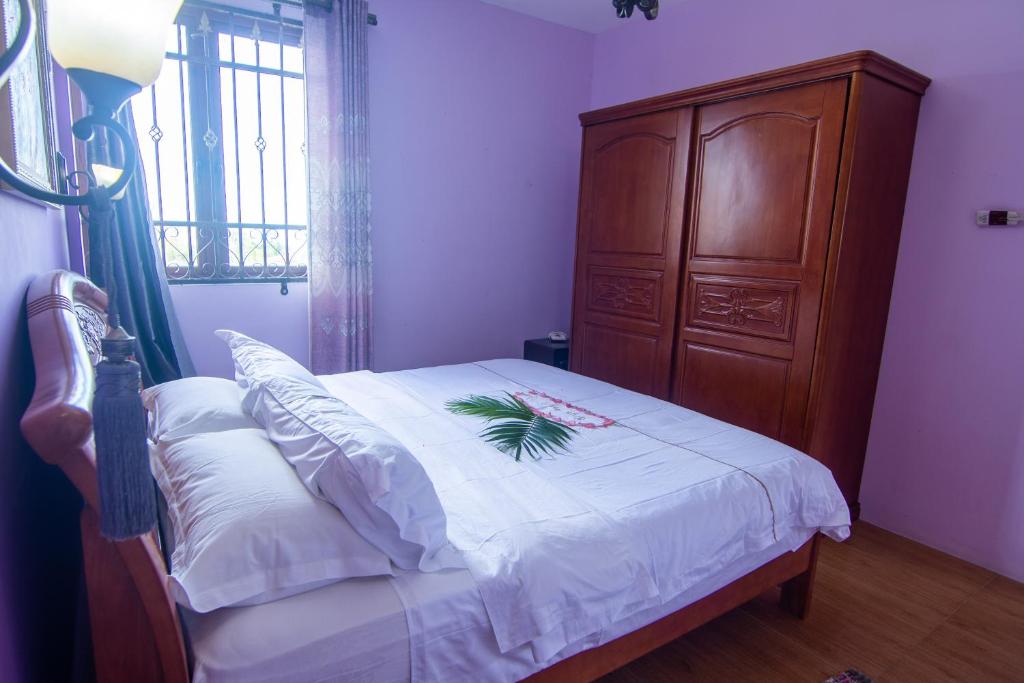 Postel nebo postele na pokoji v ubytování Blue Pearl Resort