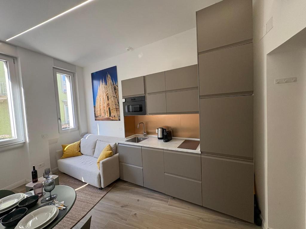 Ένα ή περισσότερα κρεβάτια σε δωμάτιο στο Milan Top 7 attractions at Metro1 - Charming flat