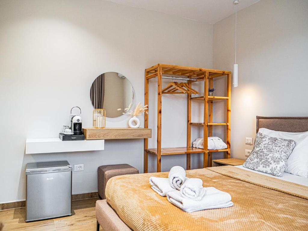 Voodi või voodid majutusasutuse Ion Rooms toas