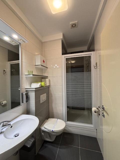 Koupelna v ubytování Apartments Adria