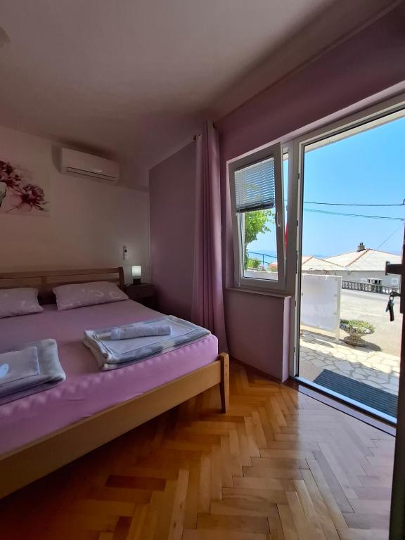 Postel nebo postele na pokoji v ubytování Guest House Pamela