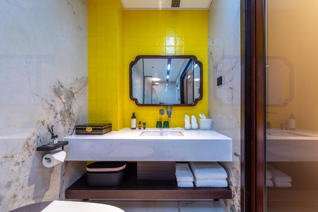 Koupelna v ubytování Tao Hotel