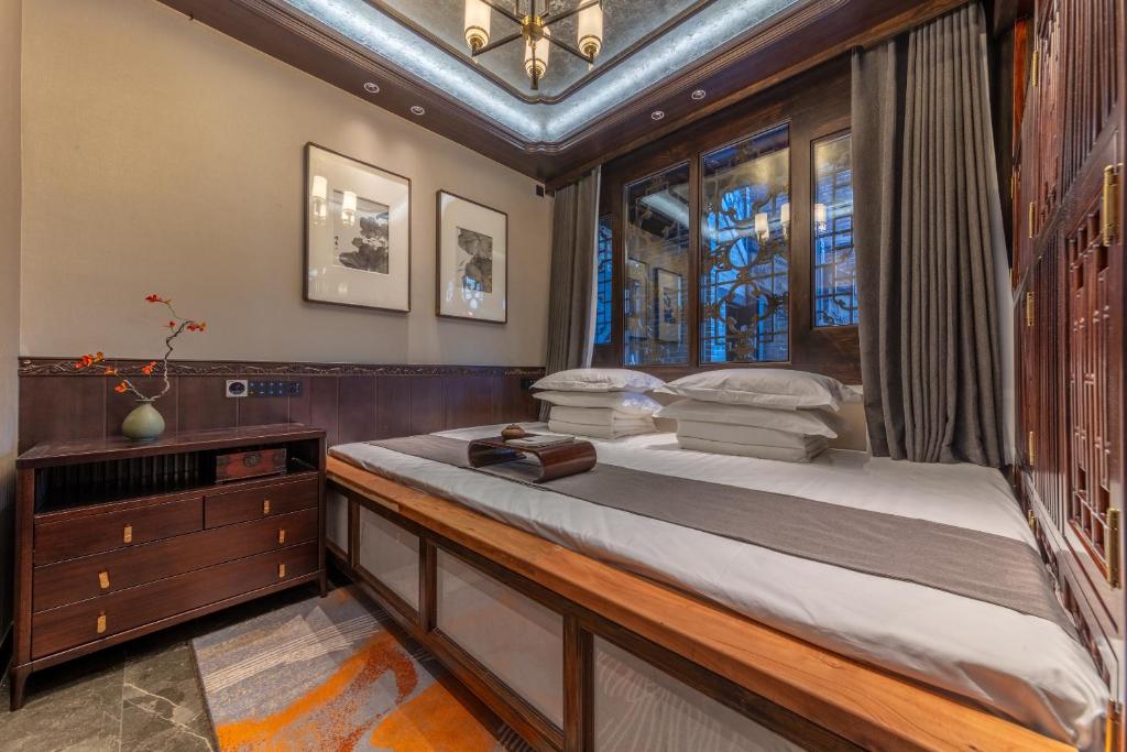 Postel nebo postele na pokoji v ubytování Tao Hotel