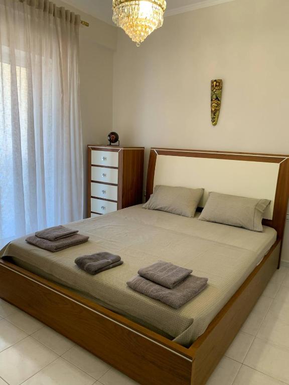 Postel nebo postele na pokoji v ubytování Διαμέρισμα στη Νεα Καλλικράτεια