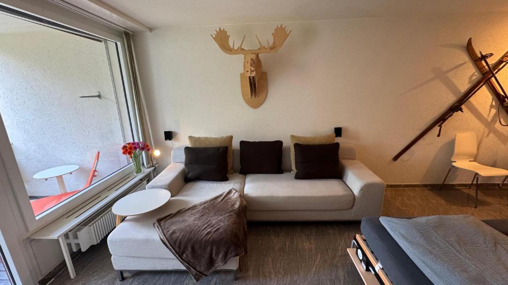 Χώρος καθιστικού στο Stylish Alpine Studio in Davos, Wifi & Netflix