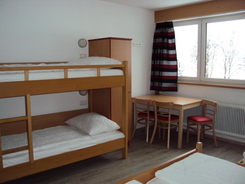 Postel nebo postele na pokoji v ubytování Jutel Obertraun