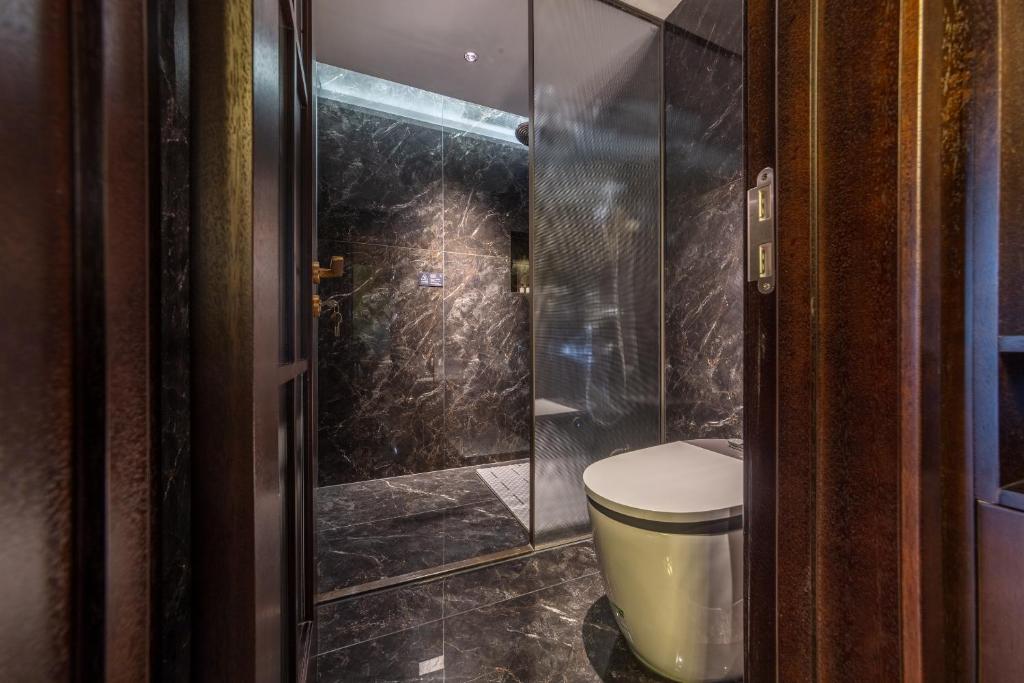 Koupelna v ubytování Tao Hotel