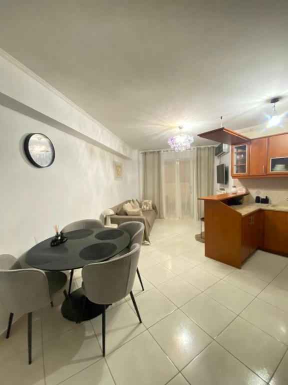 Kuchyň nebo kuchyňský kout v ubytování Cozy home