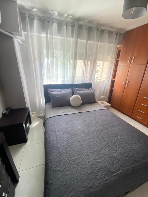 Postel nebo postele na pokoji v ubytování Cozy home