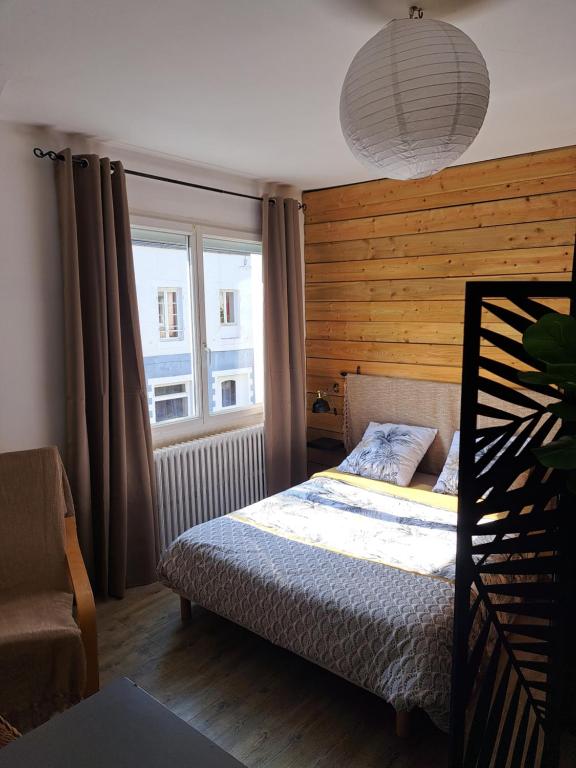 Postel nebo postele na pokoji v ubytování Studio d hotes