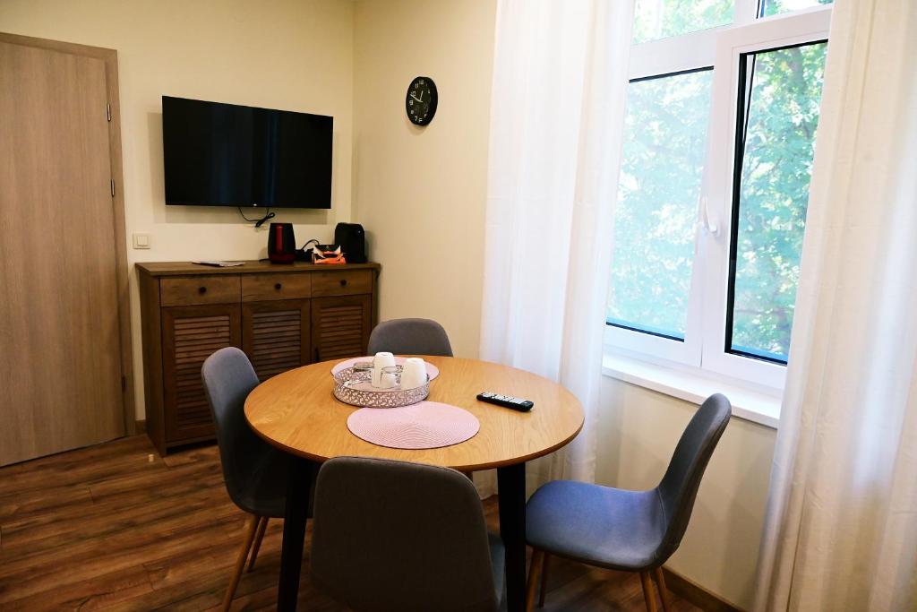 TV a/nebo společenská místnost v ubytování The House - Central Boutique Apartments