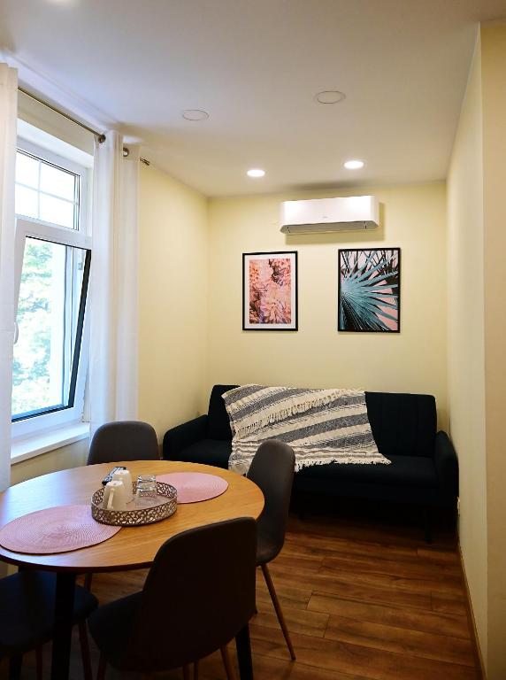 Posezení v ubytování The House - Central Boutique Apartments