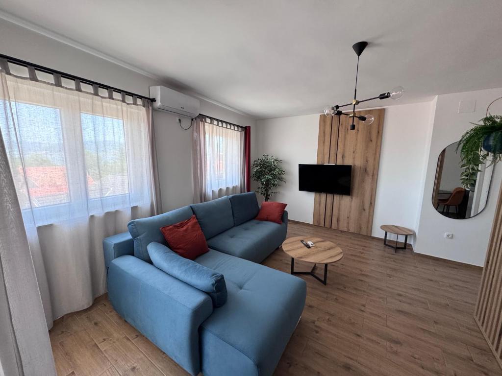 TV a/nebo společenská místnost v ubytování Moms house 2