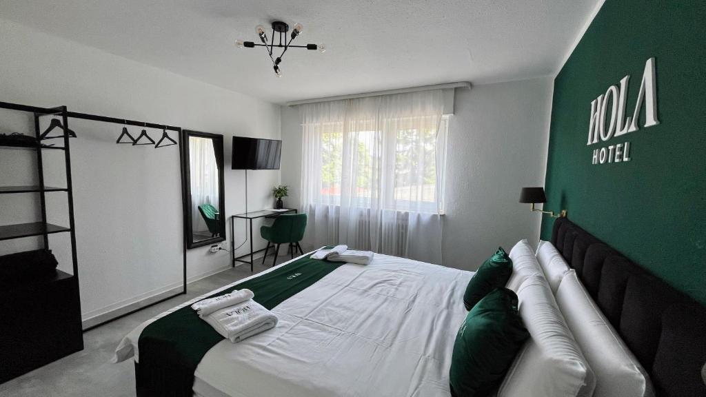 Postel nebo postele na pokoji v ubytování Hola Hotel Stuttgart