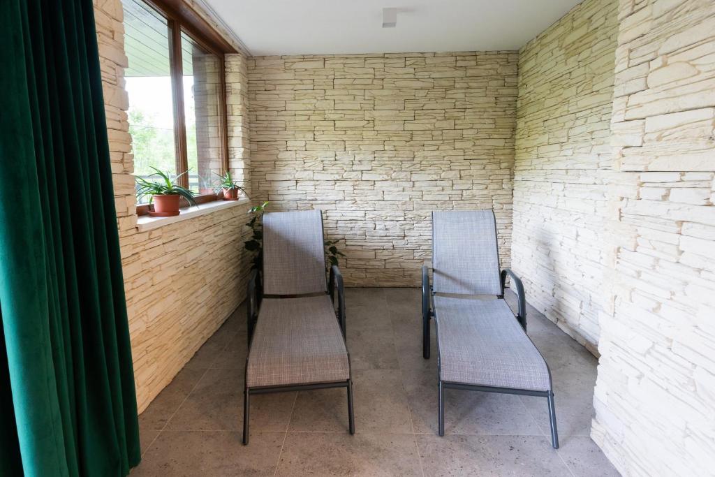 Posezení v ubytování Útulný apartmán v srdci Krkonoš se saunou
