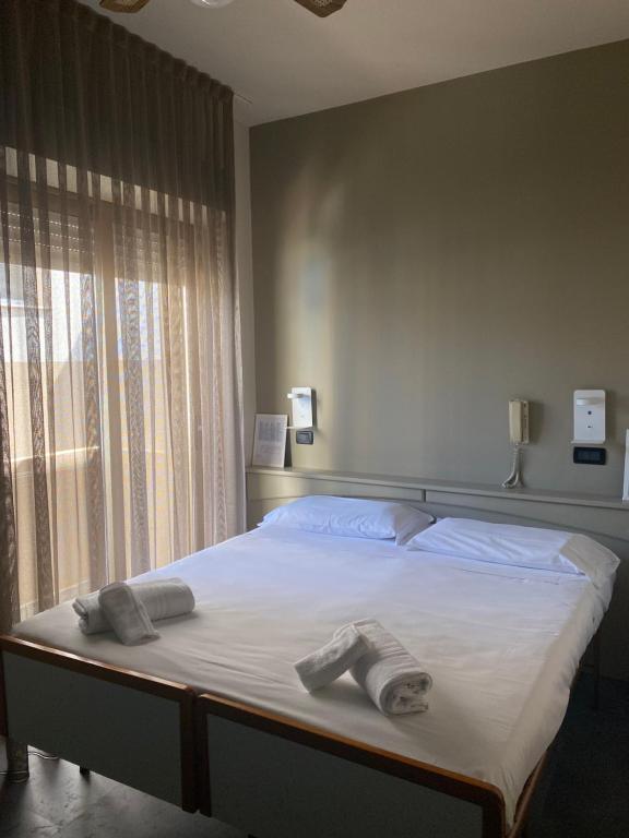 Postel nebo postele na pokoji v ubytování Park Hotel Serena