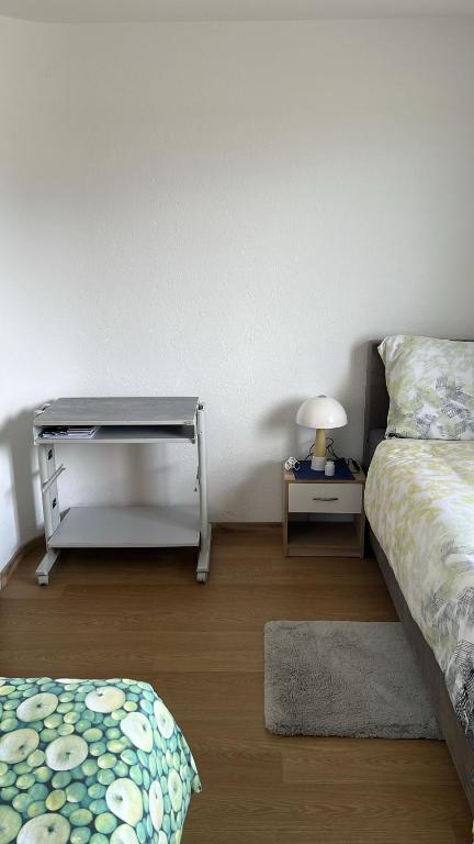 Postel nebo postele na pokoji v ubytování Zimmer in Vaduz FL