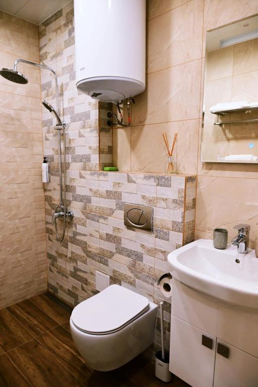 Koupelna v ubytování The House - Central Boutique Apartments