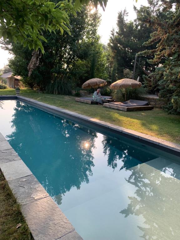 Bazén v ubytování Noccemada "Spirit of Bali" Lodge, Pool & Spa nebo v jeho okolí