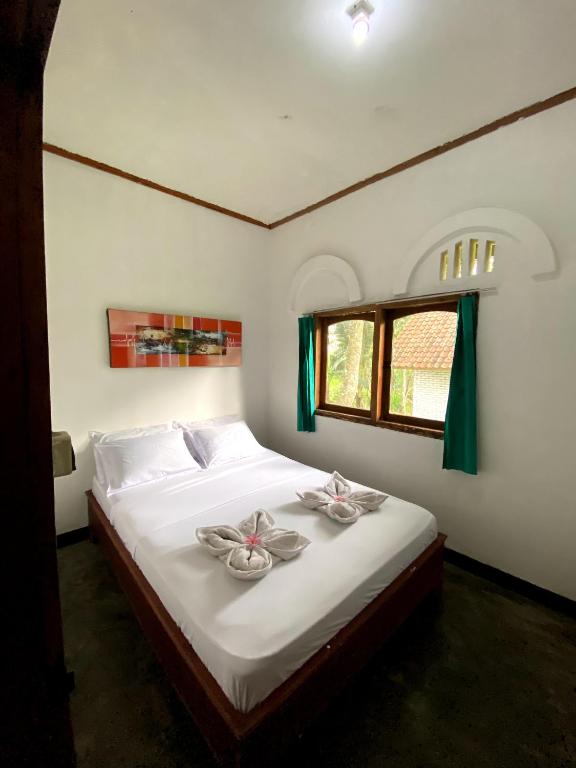 Hakiki Inn Bungalows - 14