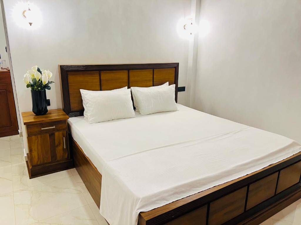 Postel nebo postele na pokoji v ubytování Villa Navodi