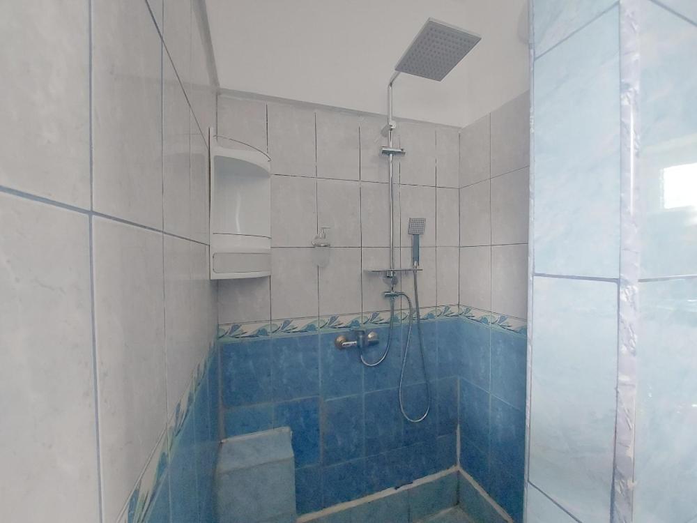 Koupelna v ubytování La Perla Bianca Residence