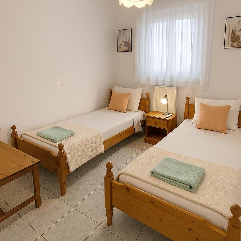 Postel nebo postele na pokoji v ubytování Alexia Apartments & Studios