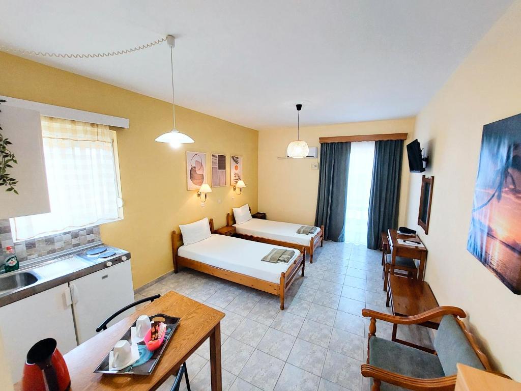 Postel nebo postele na pokoji v ubytování Alexia Apartments & Studios
