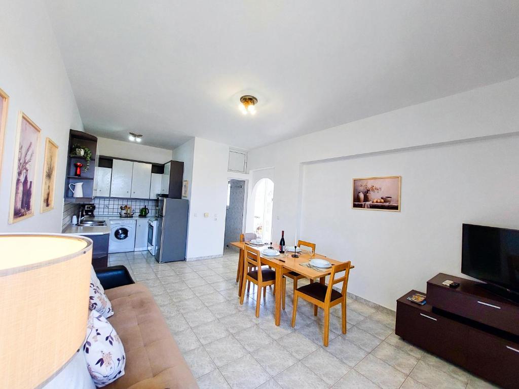 Kuchyň nebo kuchyňský kout v ubytování Alexia Apartments & Studios