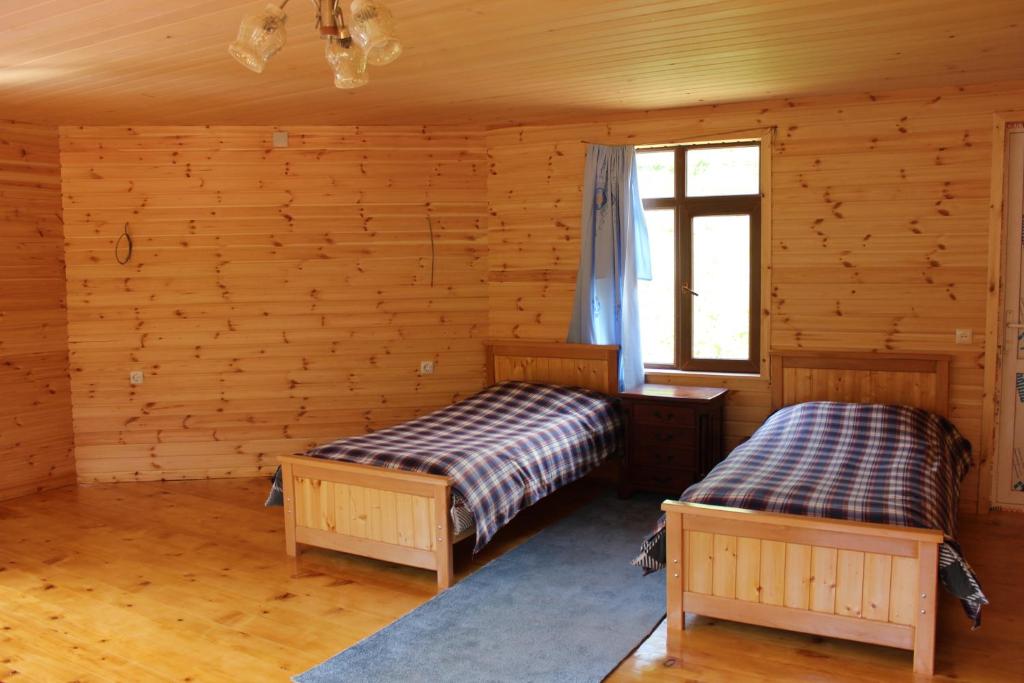 Postel nebo postele na pokoji v ubytování GuestHouse Ellie- Elisabeth