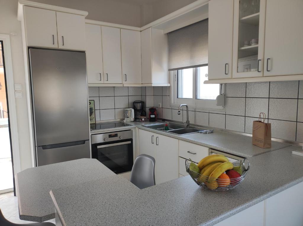 A kitchen or kitchenette at Maries Seaside Home