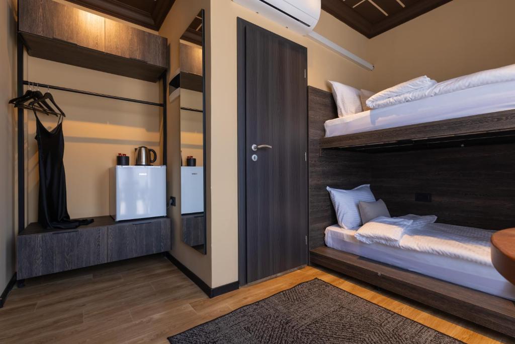 Postel nebo postele na pokoji v ubytování Agara Stays Prizren