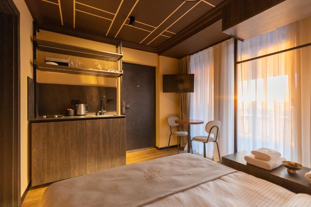 Postel nebo postele na pokoji v ubytování Agara Stays Prizren