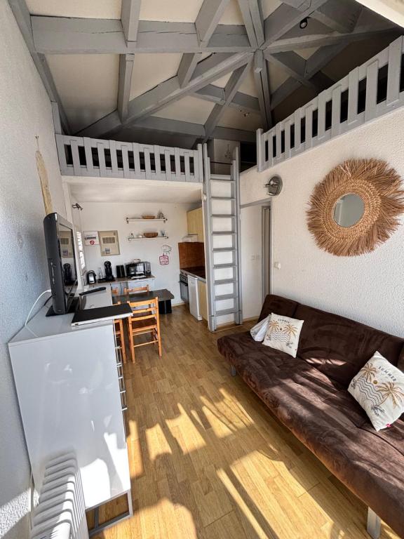 Kuchyň nebo kuchyňský kout v ubytování Appartement bord de mer