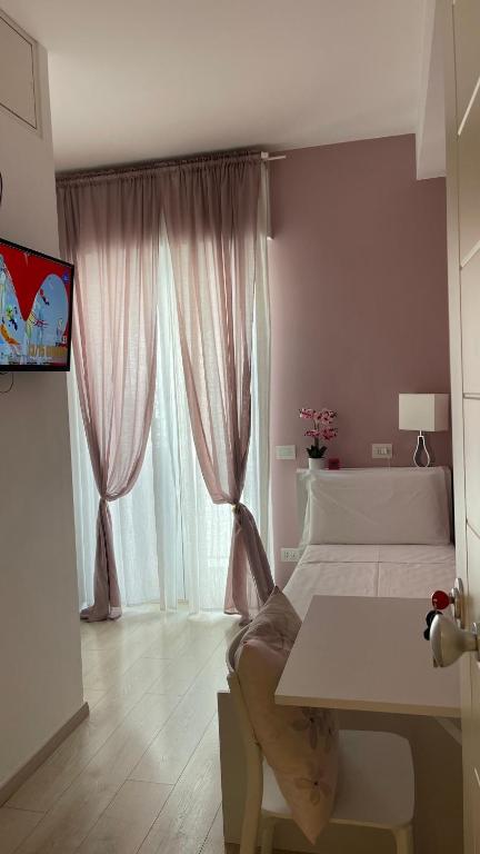 TV a/nebo společenská místnost v ubytování Dimora Francesca