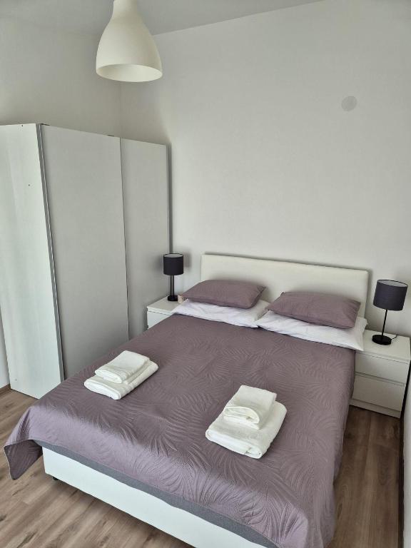 Postel nebo postele na pokoji v ubytování Apartment Misic